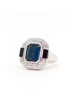 Bague art déco en argent ornée d'une pierre bleue
