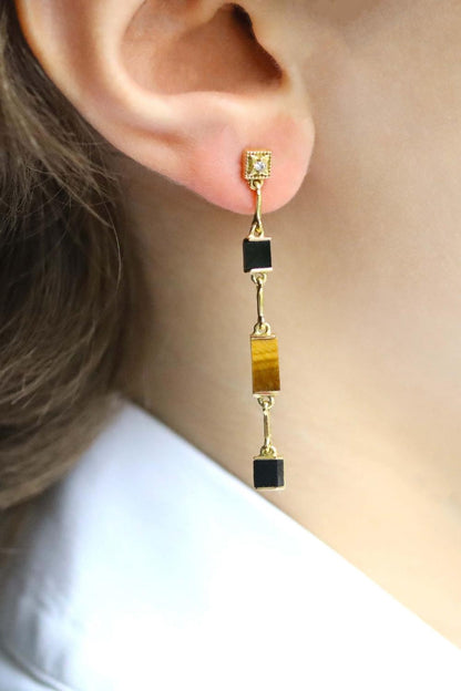 Boucles d'oreilles pendantes en oeil de tigre et onyx noir