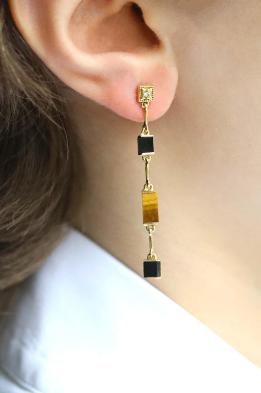 Boucles d'oreilles pendantes en oeil de tigre et onyx noir