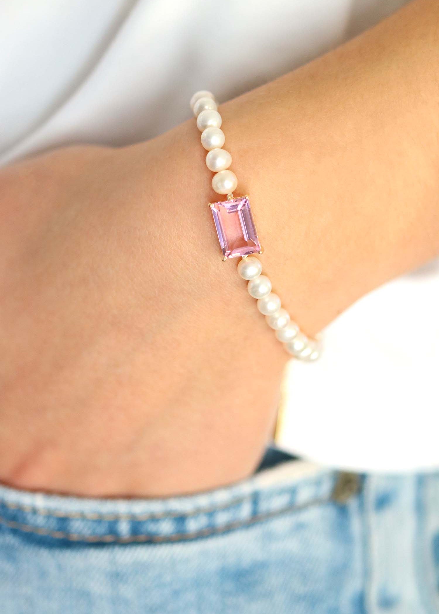 Bracelet de perles et pierre centrale en quartz rose