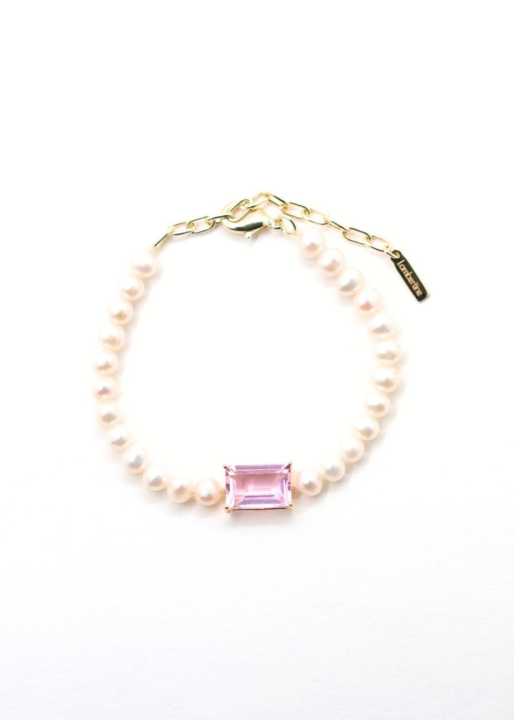 Bracelet de perles et pierre centrale en quartz rose