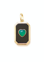 pendentif octogonal en onyx noir orné d'un coeur en onyx vert