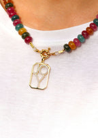 pendentif octogonale avec le mot Joy ajouré