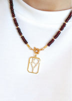 pendentif octogonale avec le mot JOY pavé et ajouré