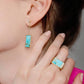 Boucles d'oreilles pendantes plaqué or serties de turquoise